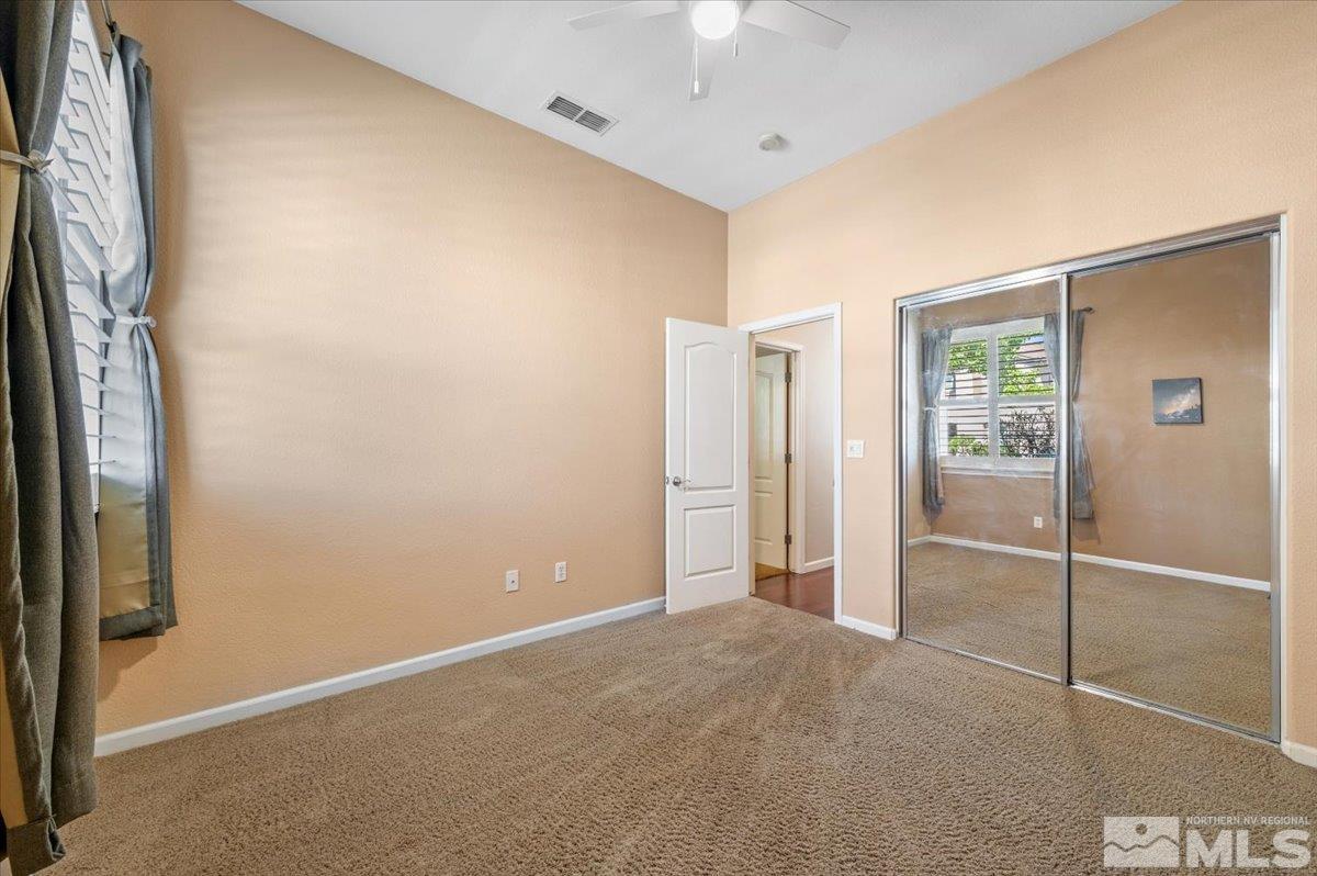 10665 Autumn Walk Lane Reno, NV 89521 - Photo 20 of 35 an empty room with windows