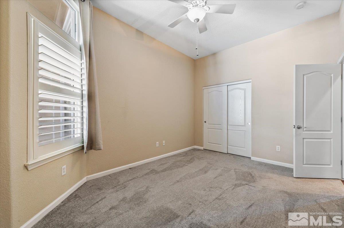 10665 Autumn Walk Lane Reno, NV 89521 - Photo 23 of 35 a view of an empty room with a window