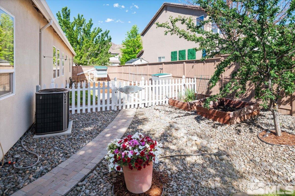 10665 Autumn Walk Lane Reno, NV 89521 - Photo 27 of 35 a garden view with a seating space