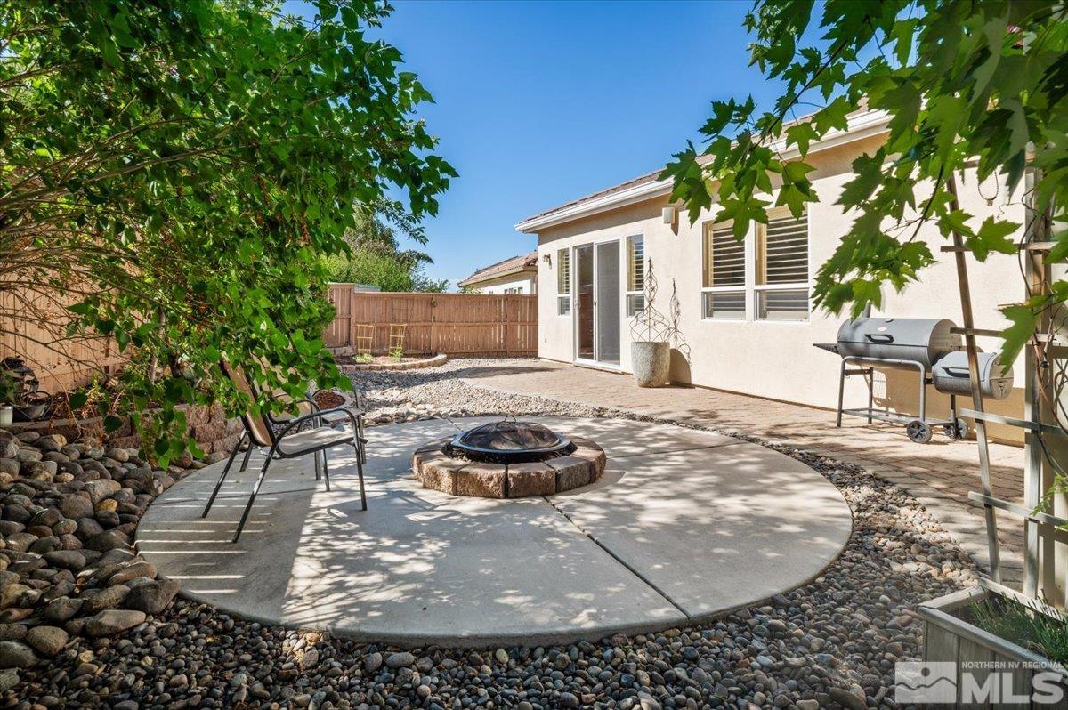 10665 Autumn Walk Lane Reno, NV 89521 - Photo 30 of 35 a view of a house with backyard