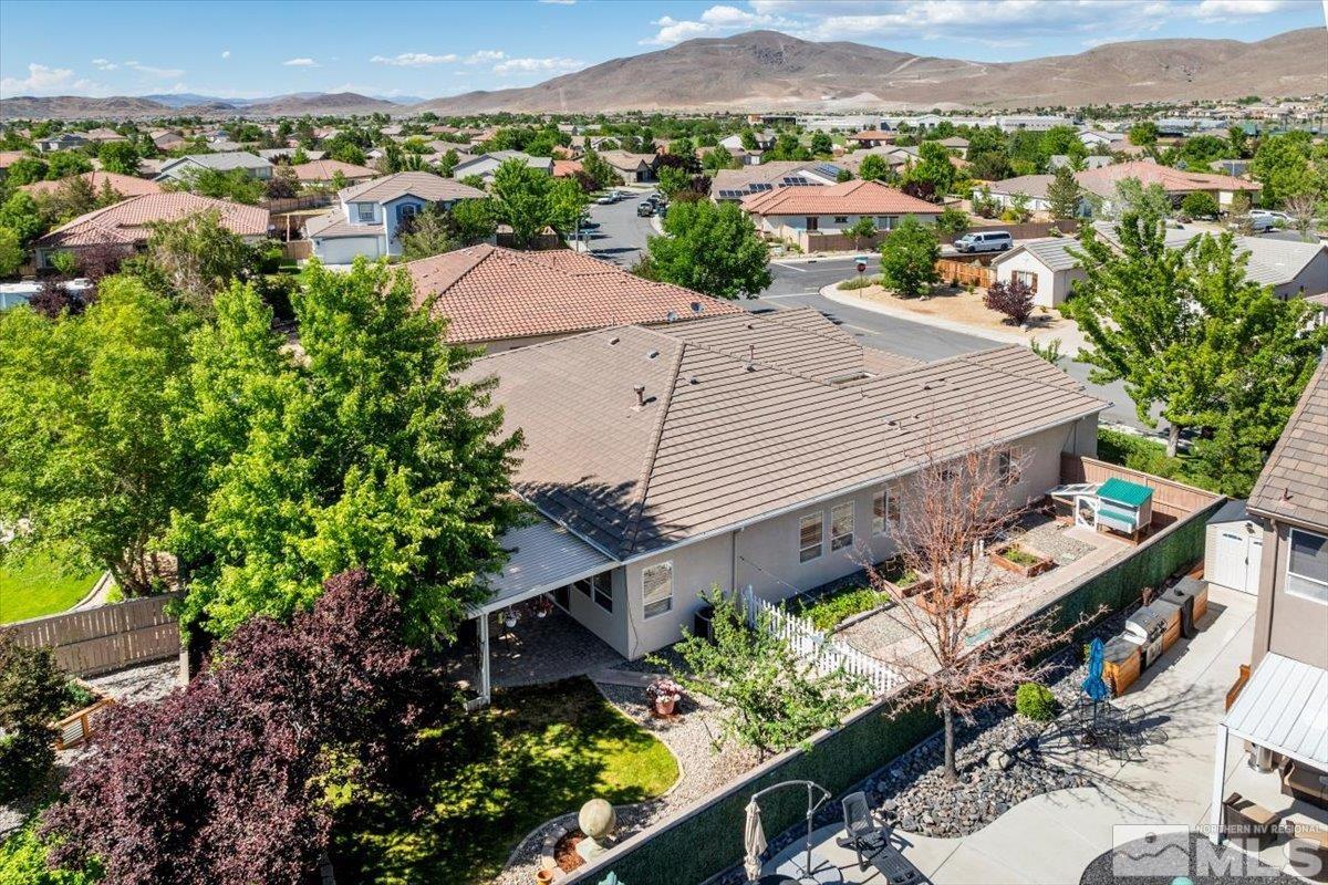 10665 Autumn Walk Lane Reno, NV 89521 - Photo 31 of 35 an aerial view of a house with a garden