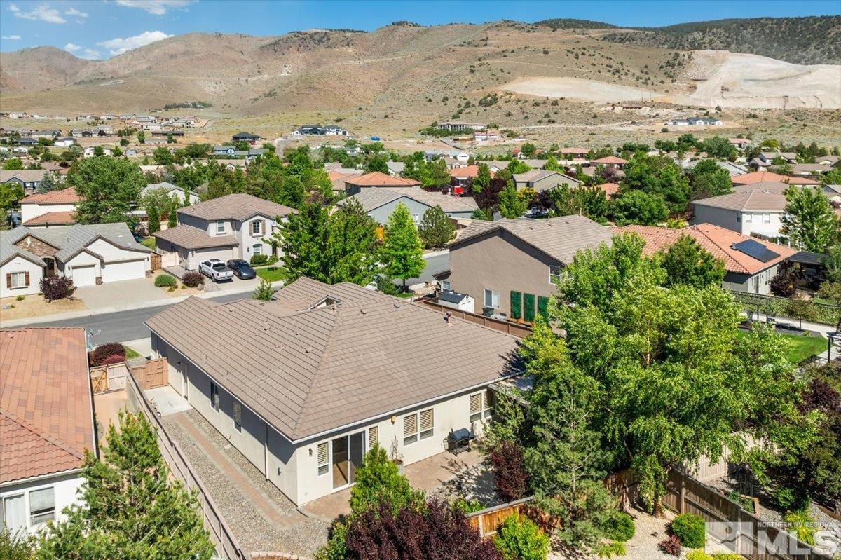 10665 Autumn Walk Lane Reno, NV 89521 - Photo 32 of 35 an aerial view of residential houses with outdoor space and trees