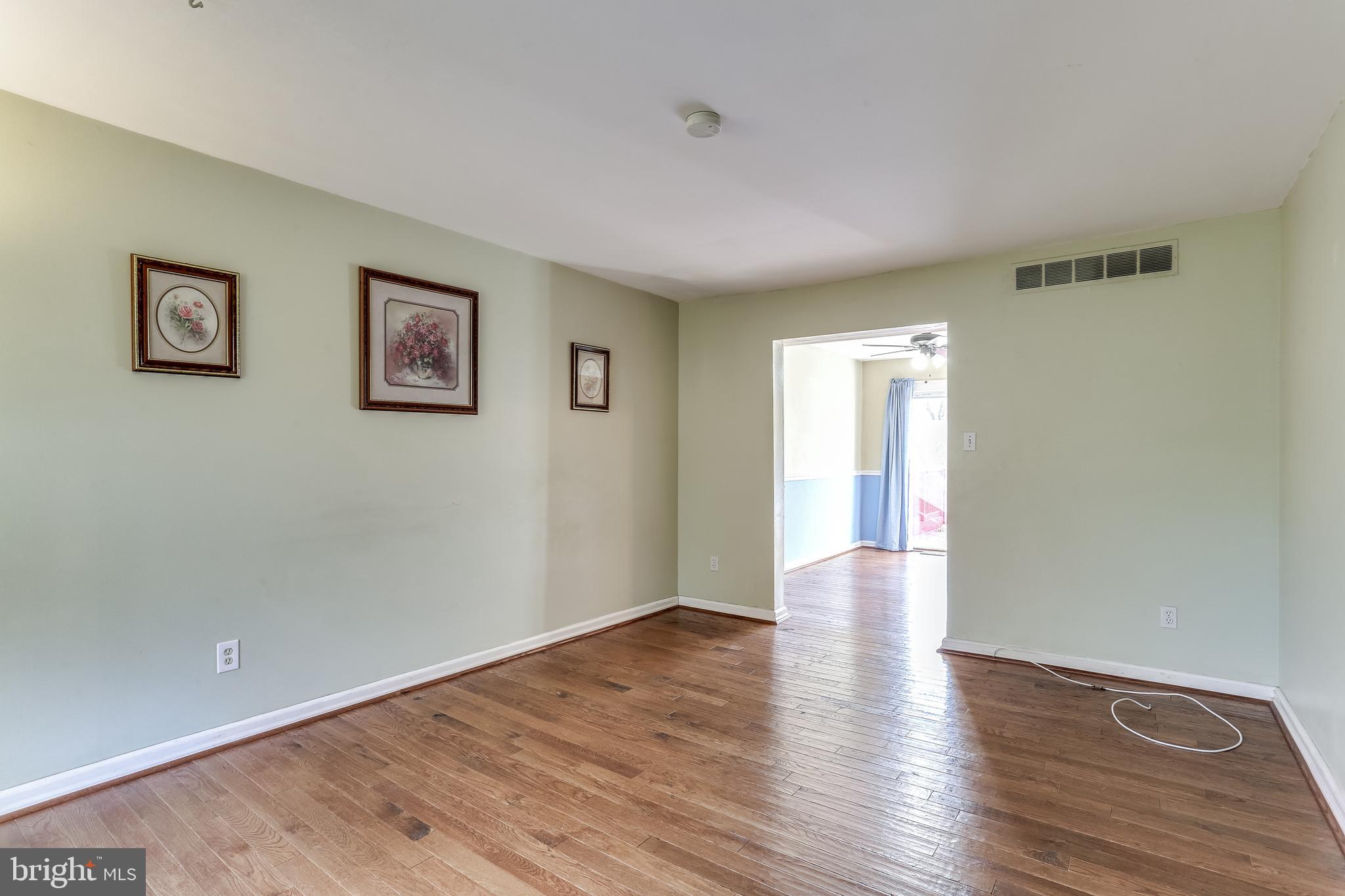 8308 Stillmeadow Road, Unit 1E Baltimore, MD 21236 - Photo 6 of 29 Living room looking into dining room
