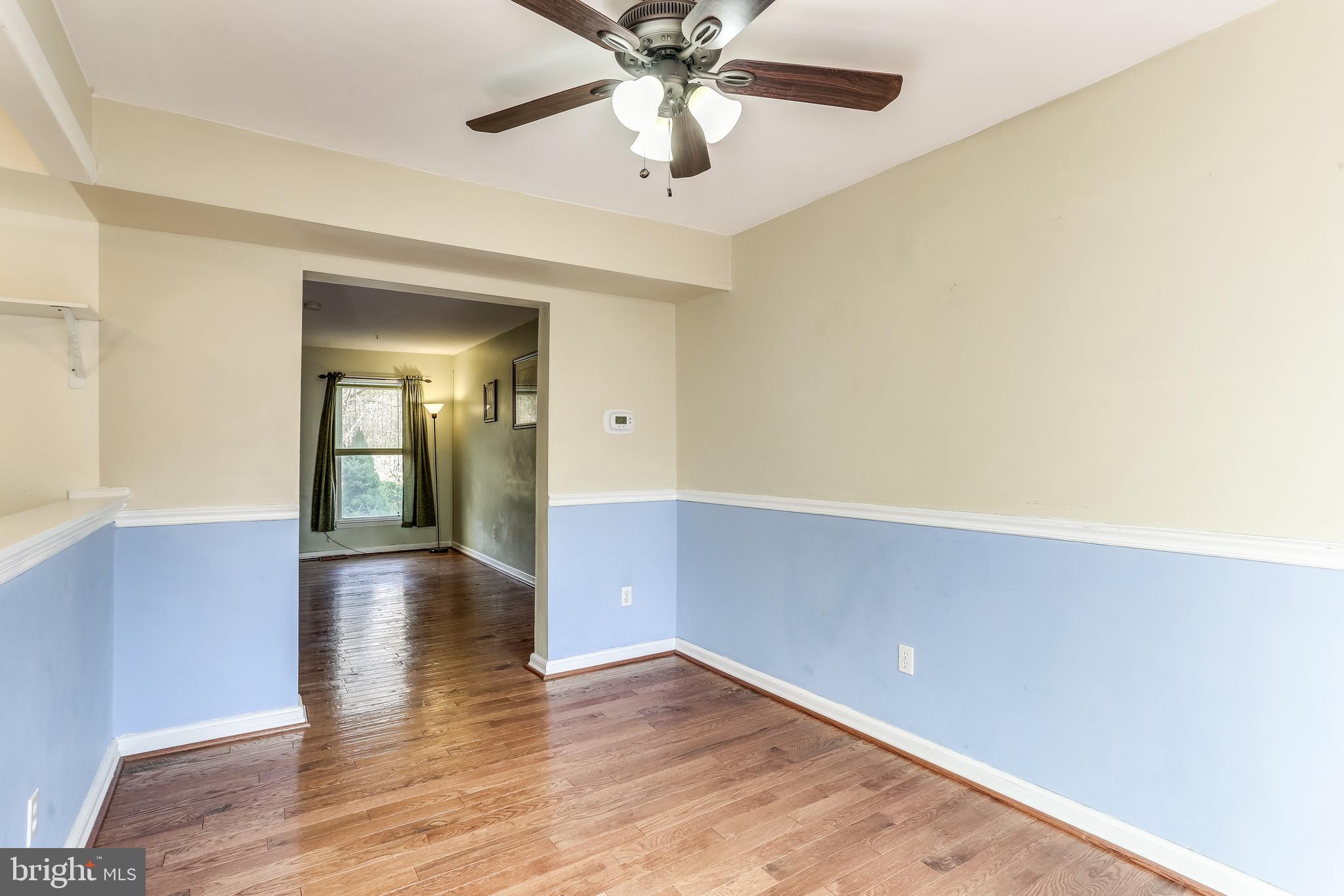 8308 Stillmeadow Road, Unit 1E Baltimore, MD 21236 - Photo 7 of 29 Dining room with hardwood flooring