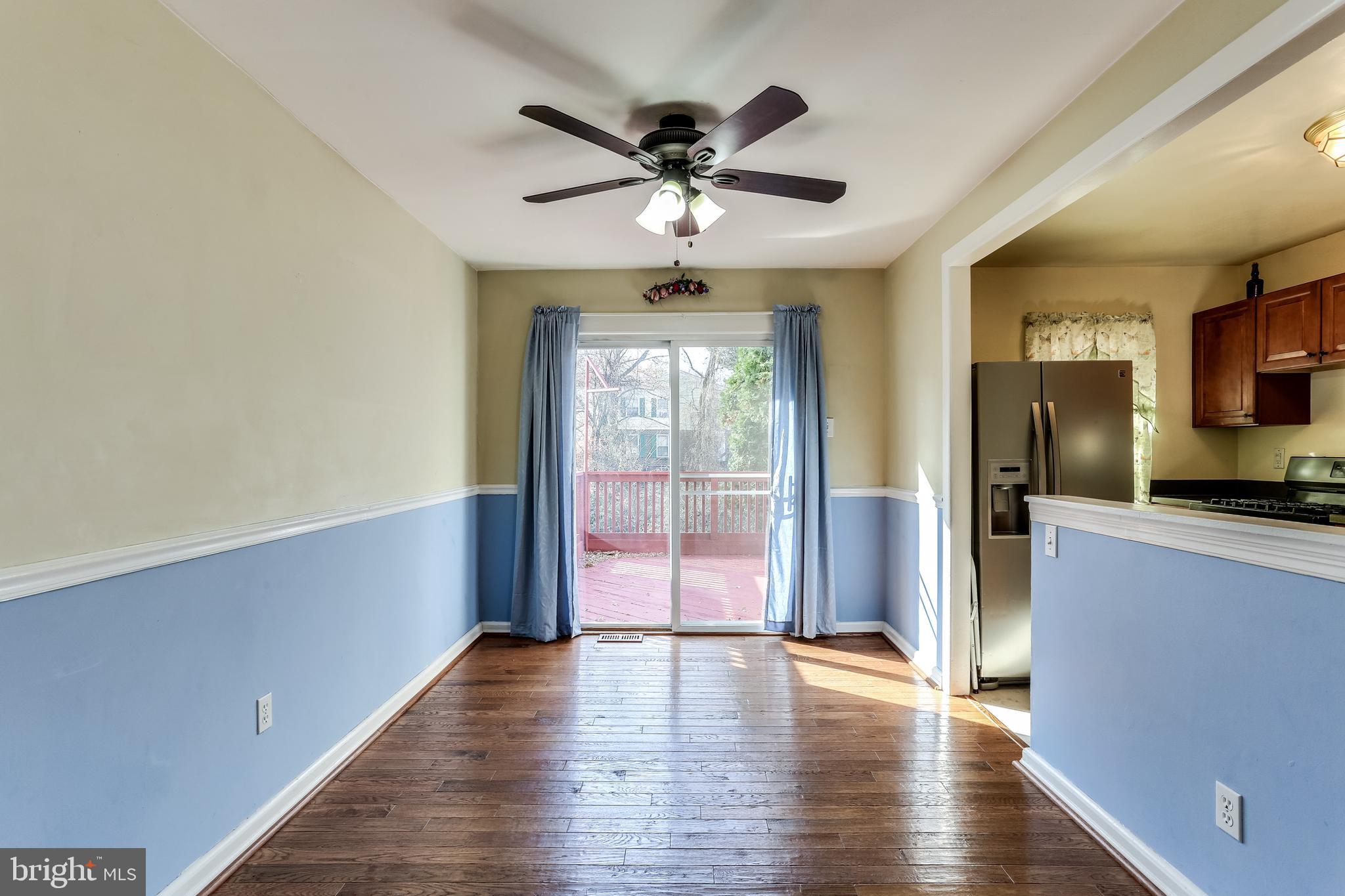 8308 Stillmeadow Road, Unit 1E Baltimore, MD 21236 - Photo 8 of 29 Dining room with chair railing
