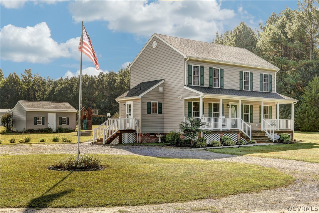 16601 Jolly Road Disputanta, VA 23842 - Photo 1 of 41 a front view of a house with a yard table and chairs