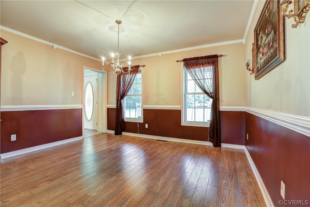 16601 Jolly Road Disputanta, VA 23842 - Photo 19 of 41 a view of livingroom with hardwood floor and window