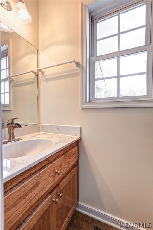 16601 Jolly Road Disputanta, VA 23842 - Photo 27 of 41 a bathroom with a sink and a window