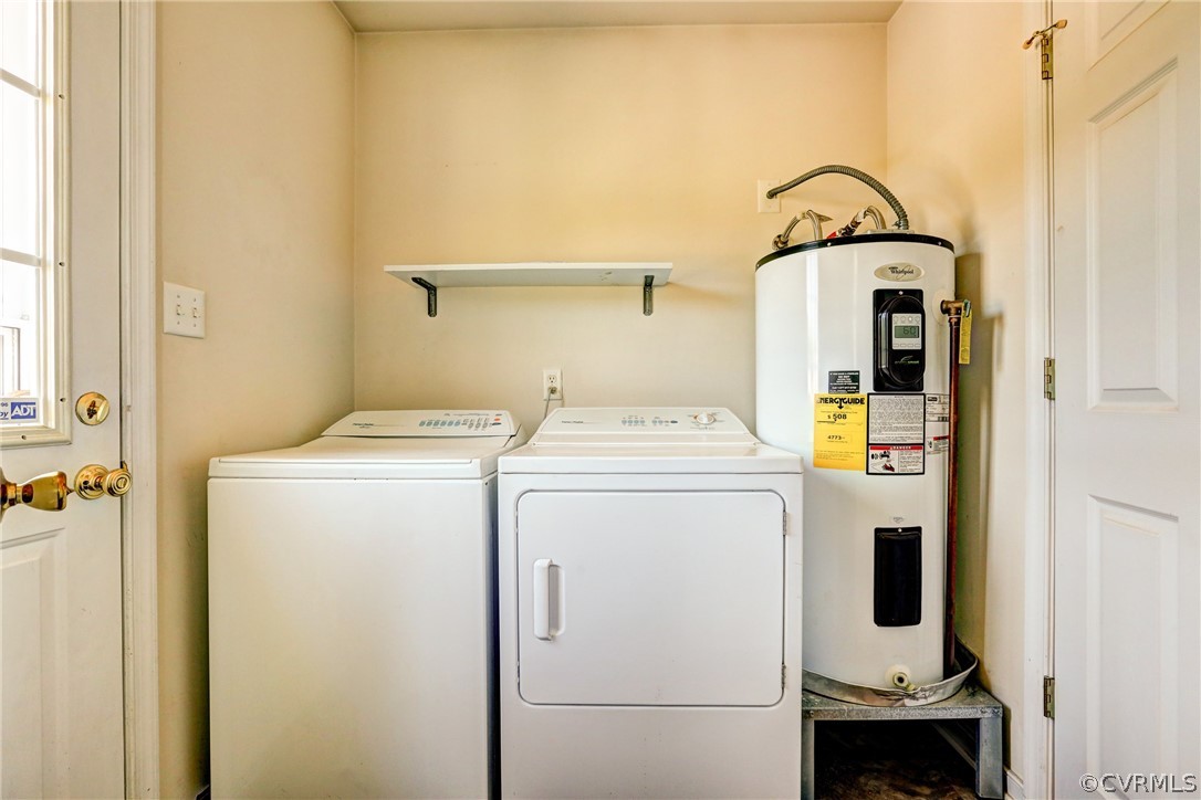 16601 Jolly Road Disputanta, VA 23842 - Photo 28 of 41 a utility room with dryer and washer