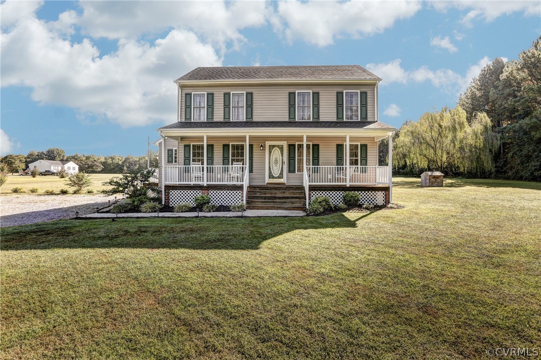 16601 Jolly Road Disputanta, VA 23842 - Photo 3 of 41 a front view of a house with a yard