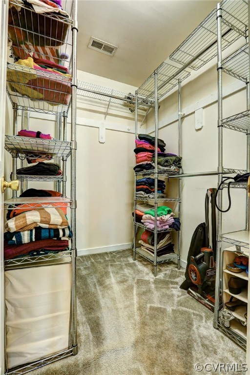 16601 Jolly Road Disputanta, VA 23842 - Photo 33 of 41 a view of a storage room with a refrigerator