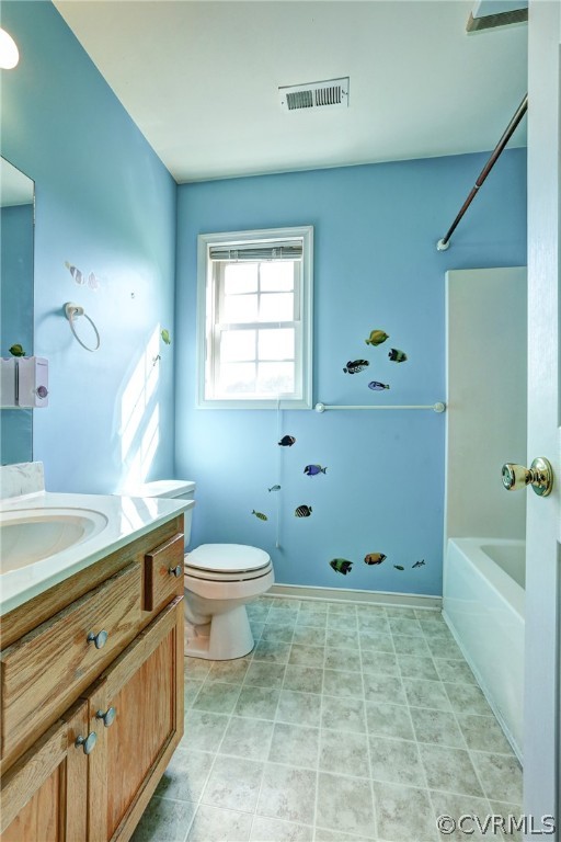16601 Jolly Road Disputanta, VA 23842 - Photo 37 of 41 a bathroom with a granite countertop toilet a sink and bathtub