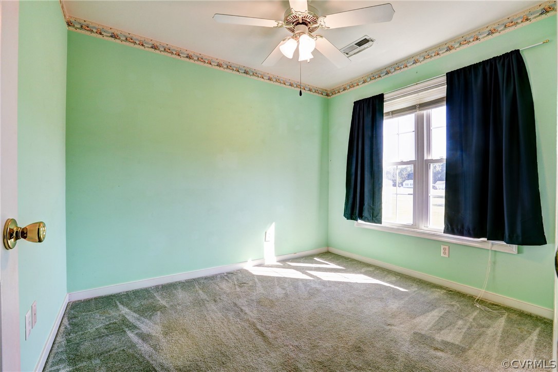 16601 Jolly Road Disputanta, VA 23842 - Photo 38 of 41 a view of an empty room with a window