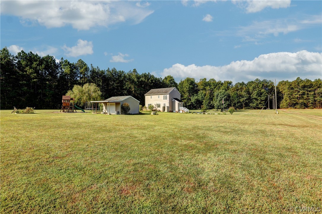 16601 Jolly Road Disputanta, VA 23842 - Photo 7 of 41 a view of an outdoor space and swimming pool