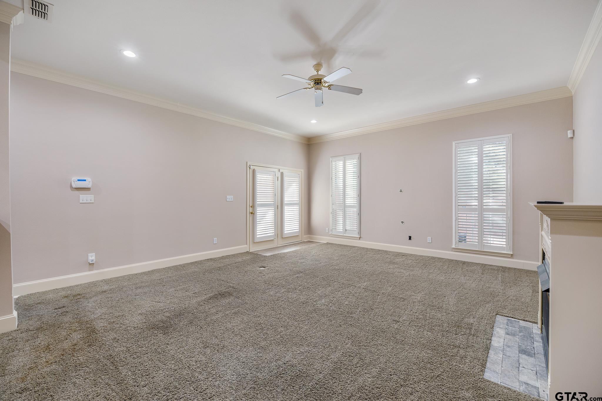 2431 Homestead Lane Tyler, TX 75701 - Photo 15 of 26 a view of an empty room with a window