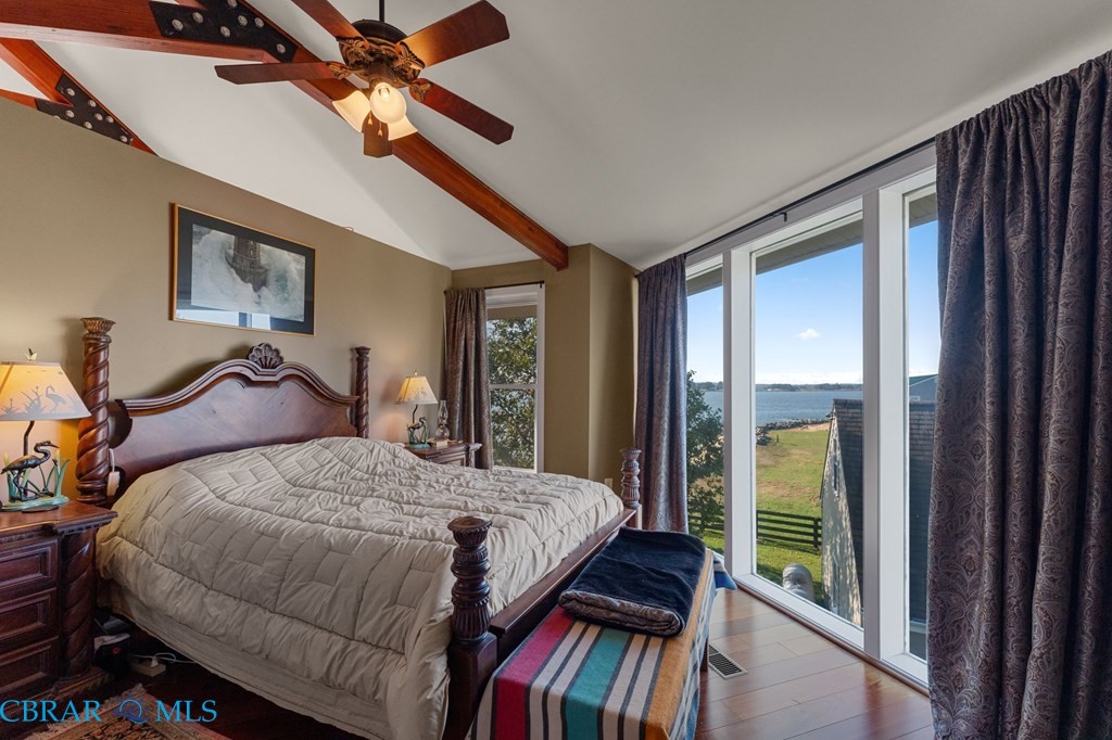 24 River Road Lottsburg, VA 22511 - Photo 28 of 35 a bedroom with a bed a large window with the outer view