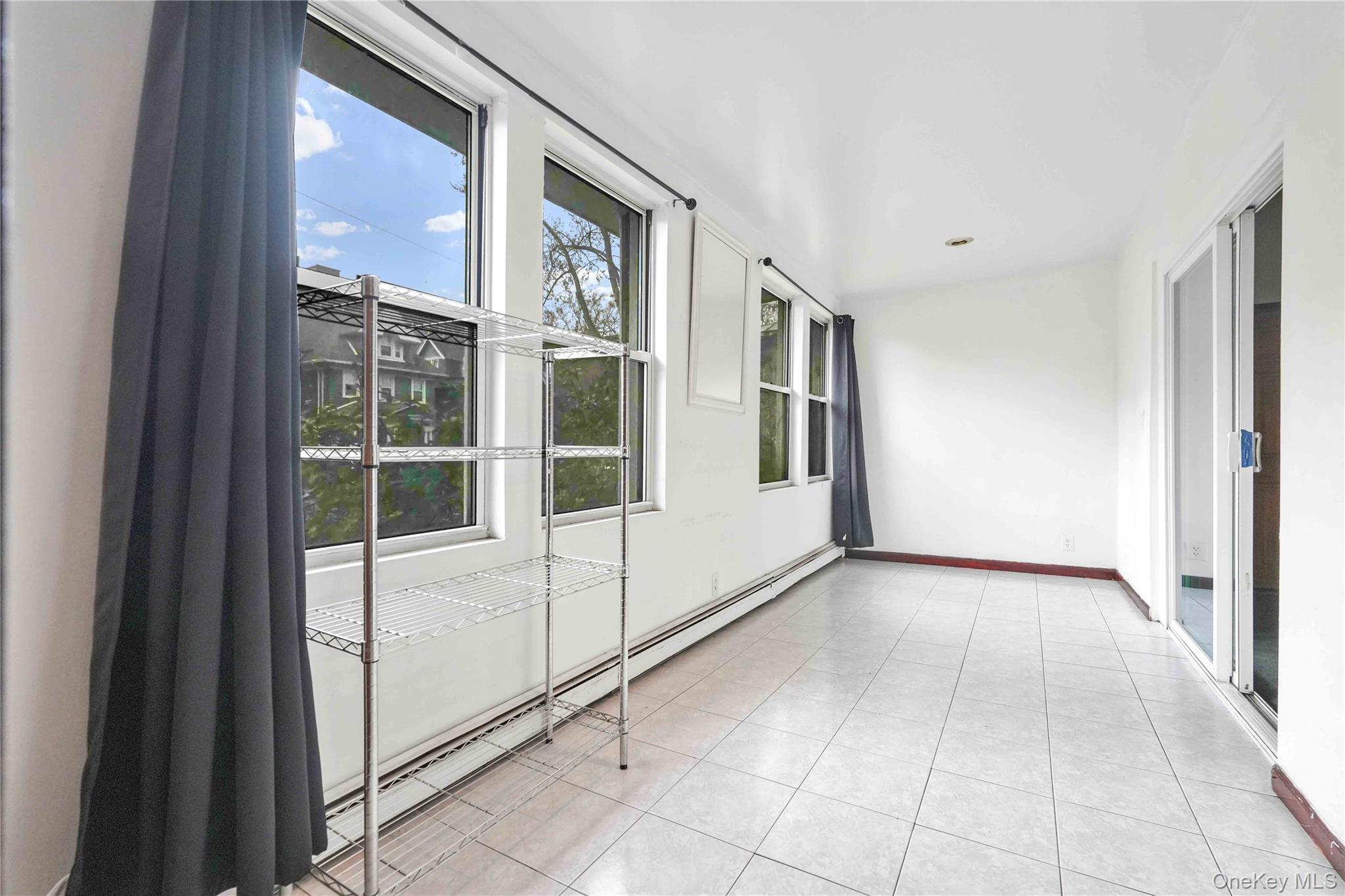 84-39 Lefferts Boulevard, Unit 1 Queens, NY 11415 - Photo 7 of 42 a view of a entryway