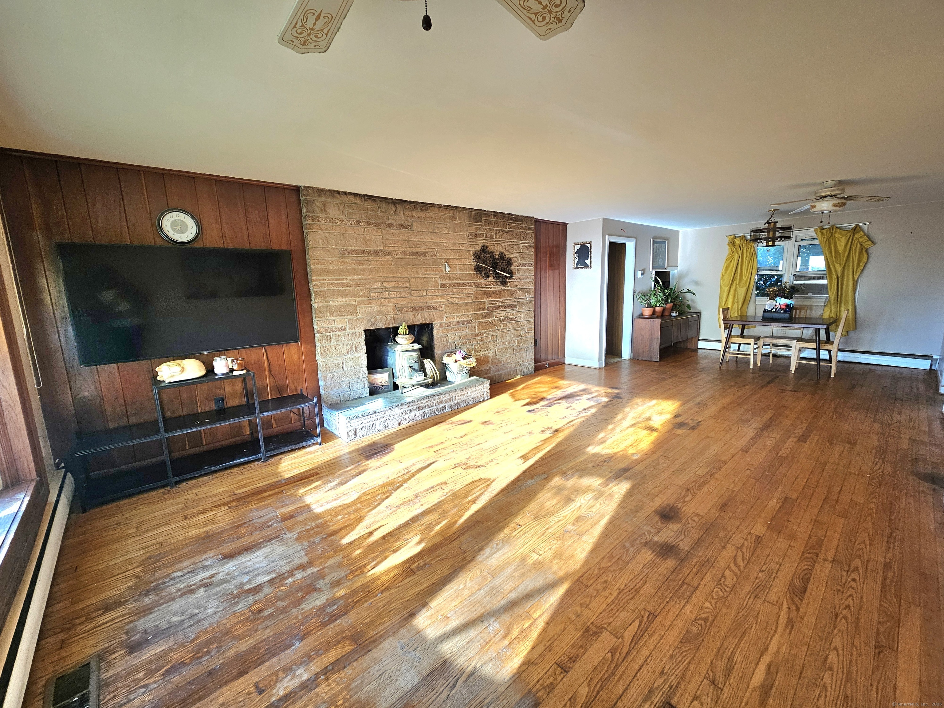 1415 North Road Killingly, CT 06241 - Photo 14 of 20 a bedroom with furniture and a flat screen tv