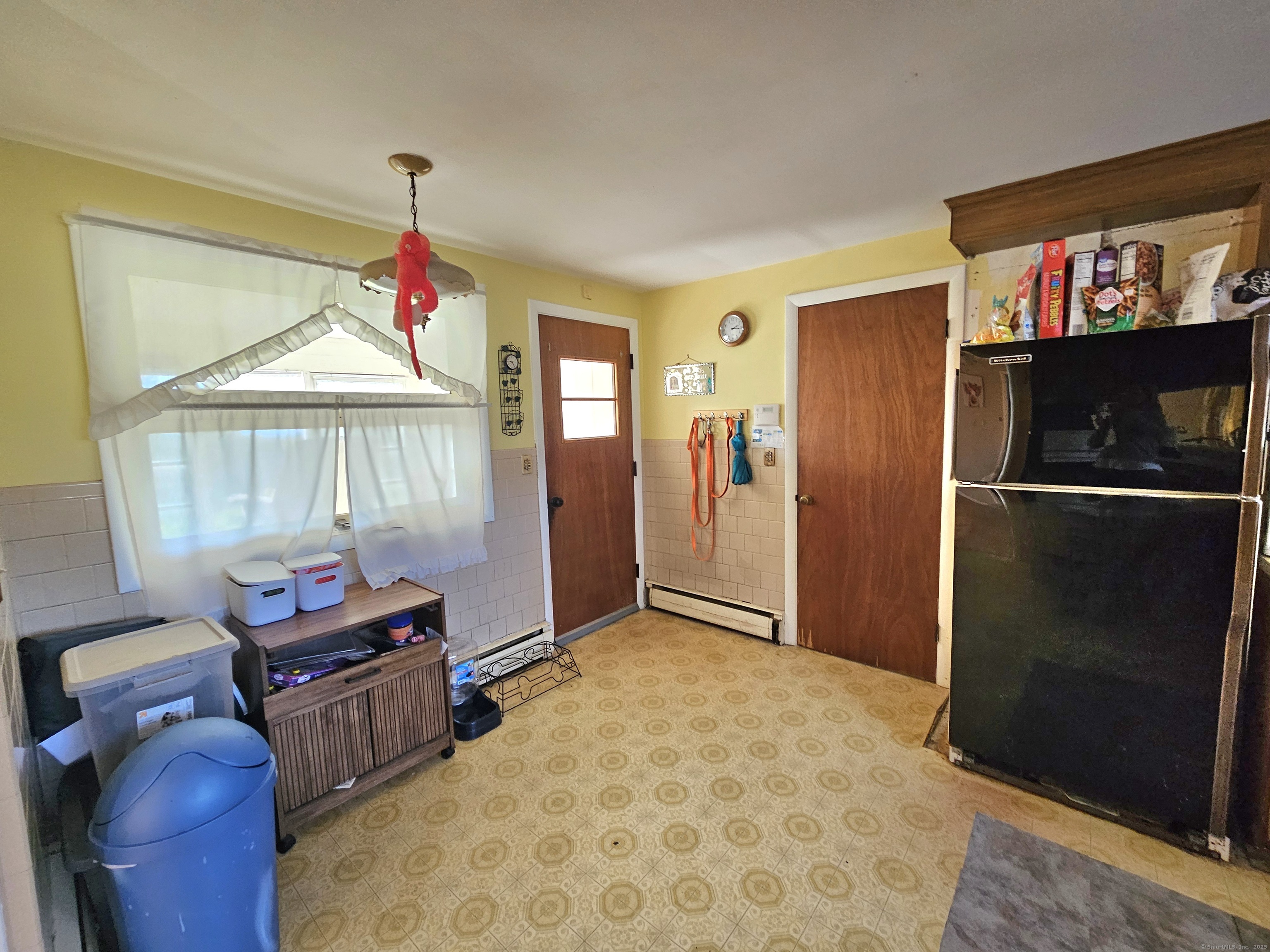 1415 North Road Killingly, CT 06241 - Photo 17 of 20 a room with furniture and a window