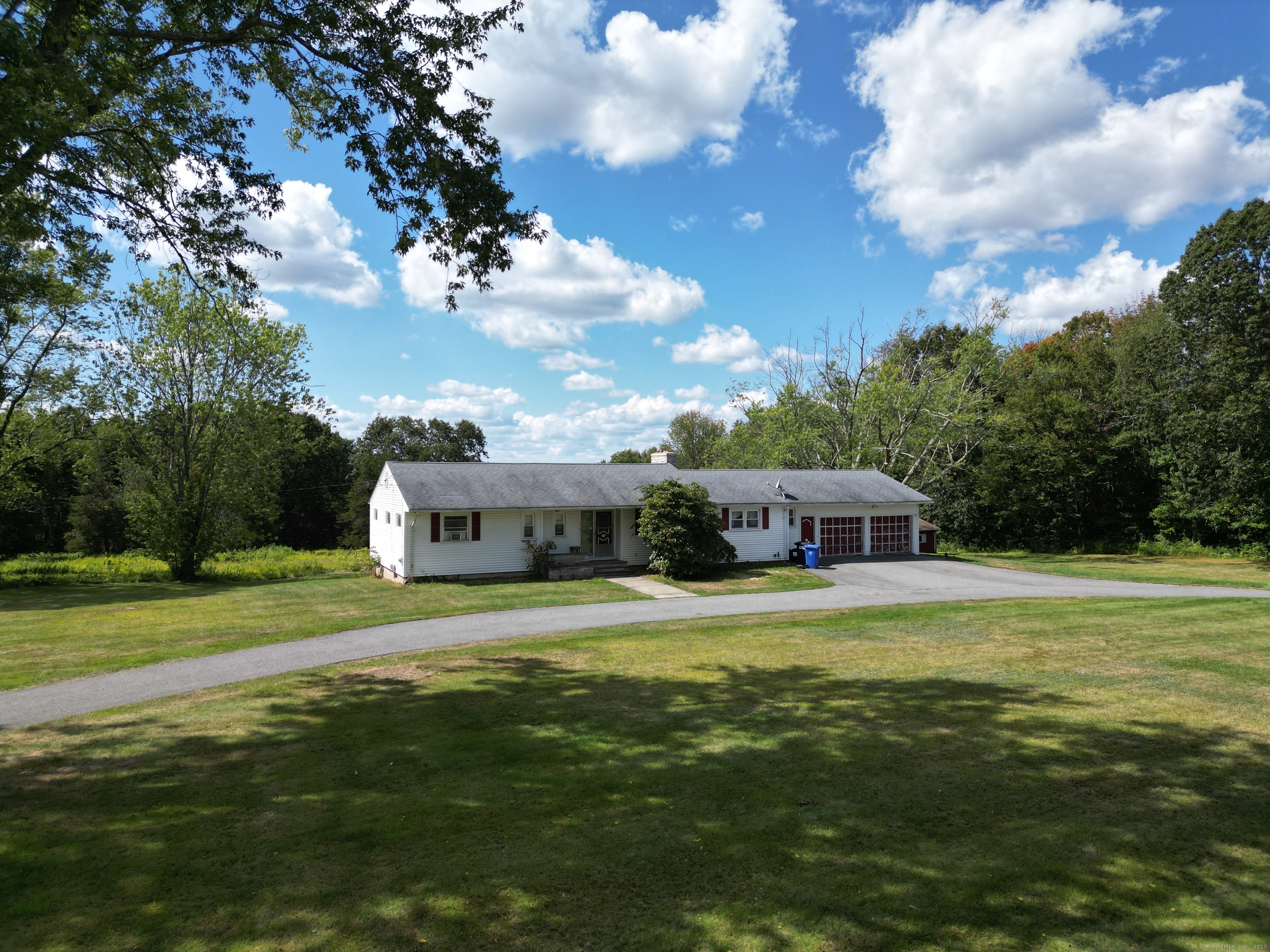 1415 North Road Killingly, CT 06241 - Photo 2 of 20 a front view of a house with a big yard
