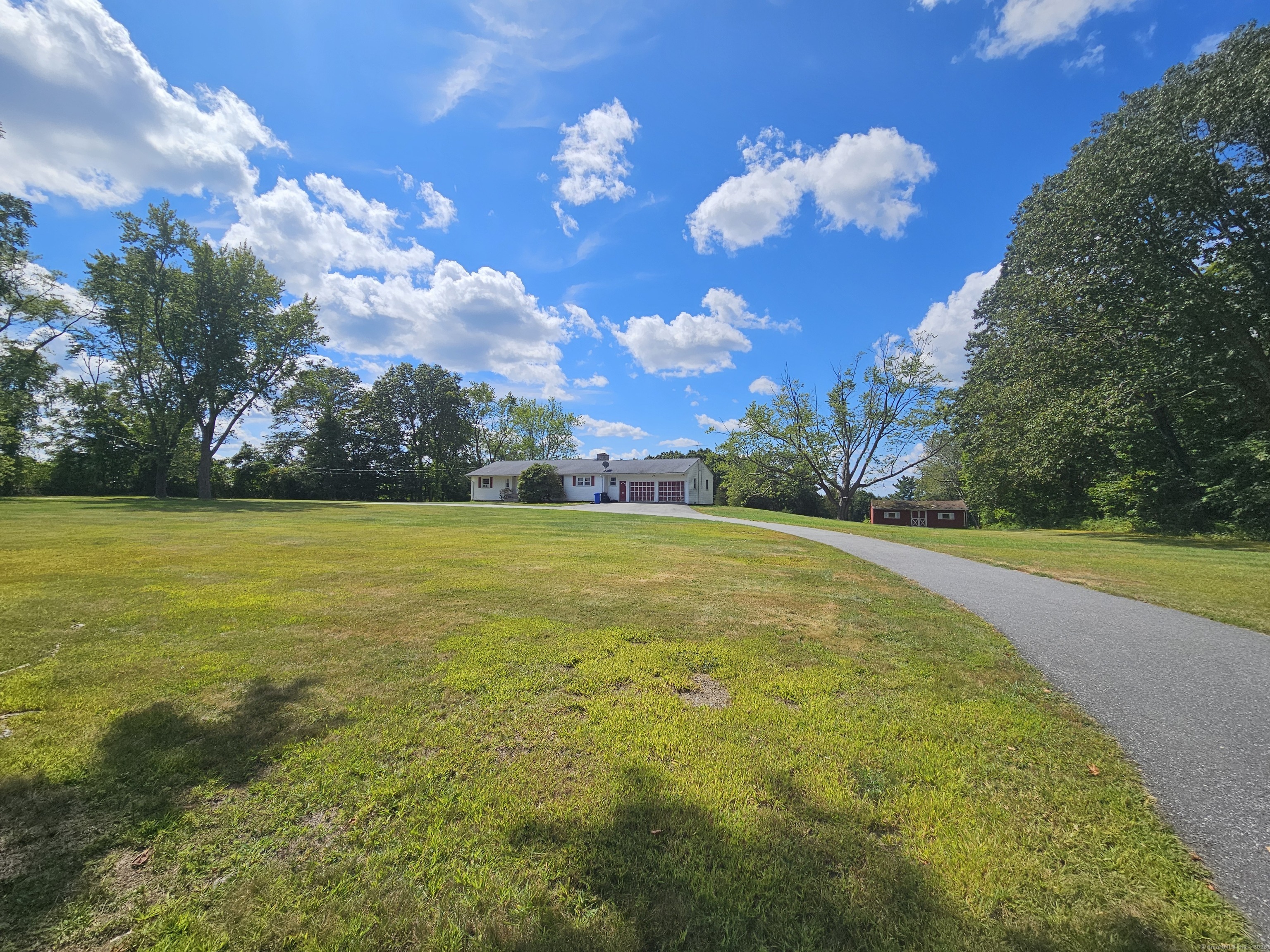 1415 North Road Killingly, CT 06241 - Photo 7 of 20 a view of a golf course with a swimming pool