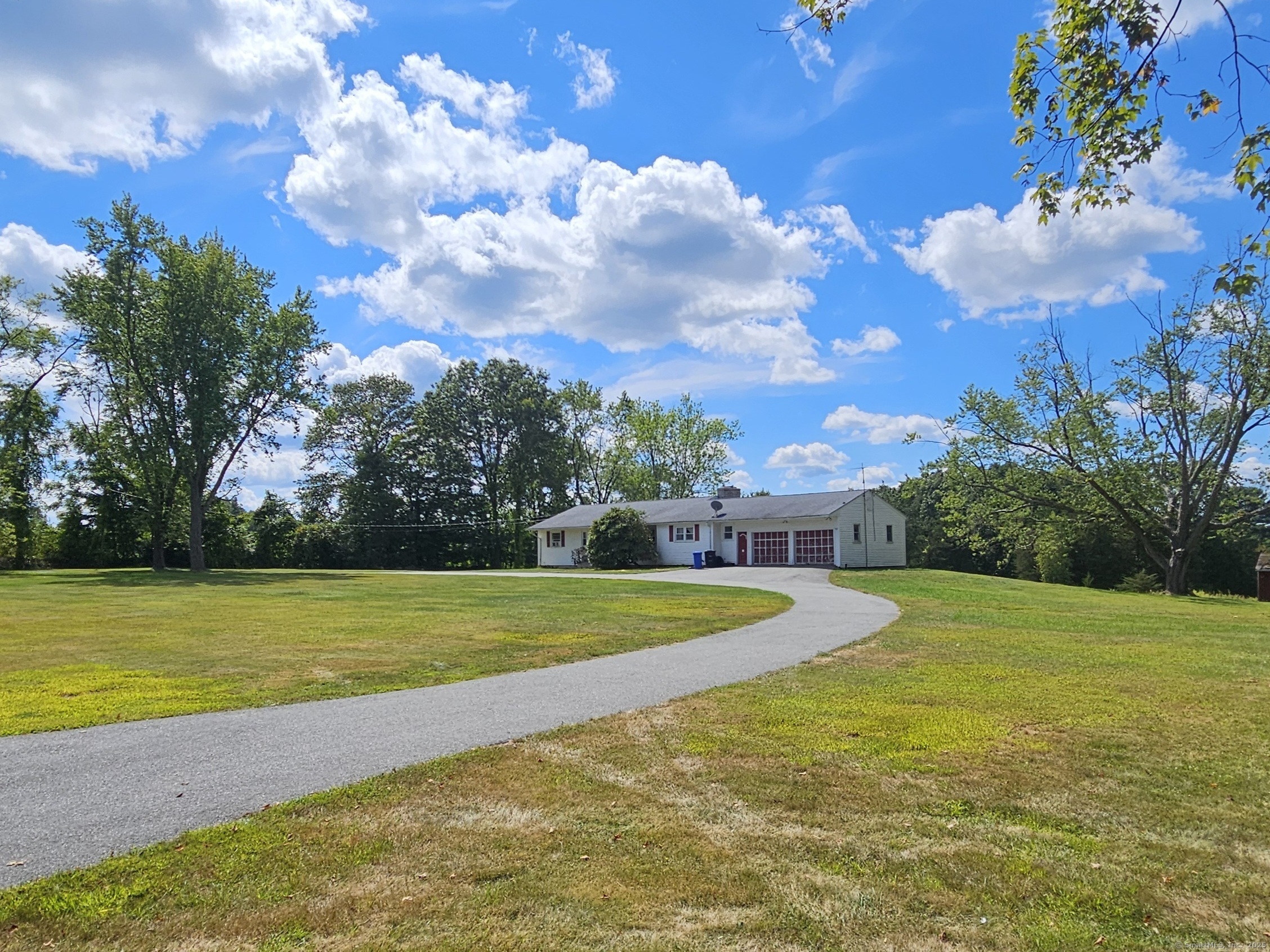 1415 North Road Killingly, CT 06241 - Photo 10 of 20 a view of a swimming pool with an outdoor space and seating area