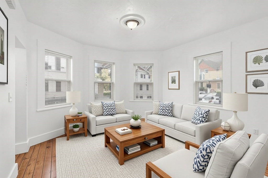 170 Allston Street, Unit 1 Providence, RI 02908 - Photo 1 of 12 a living room with furniture and a window