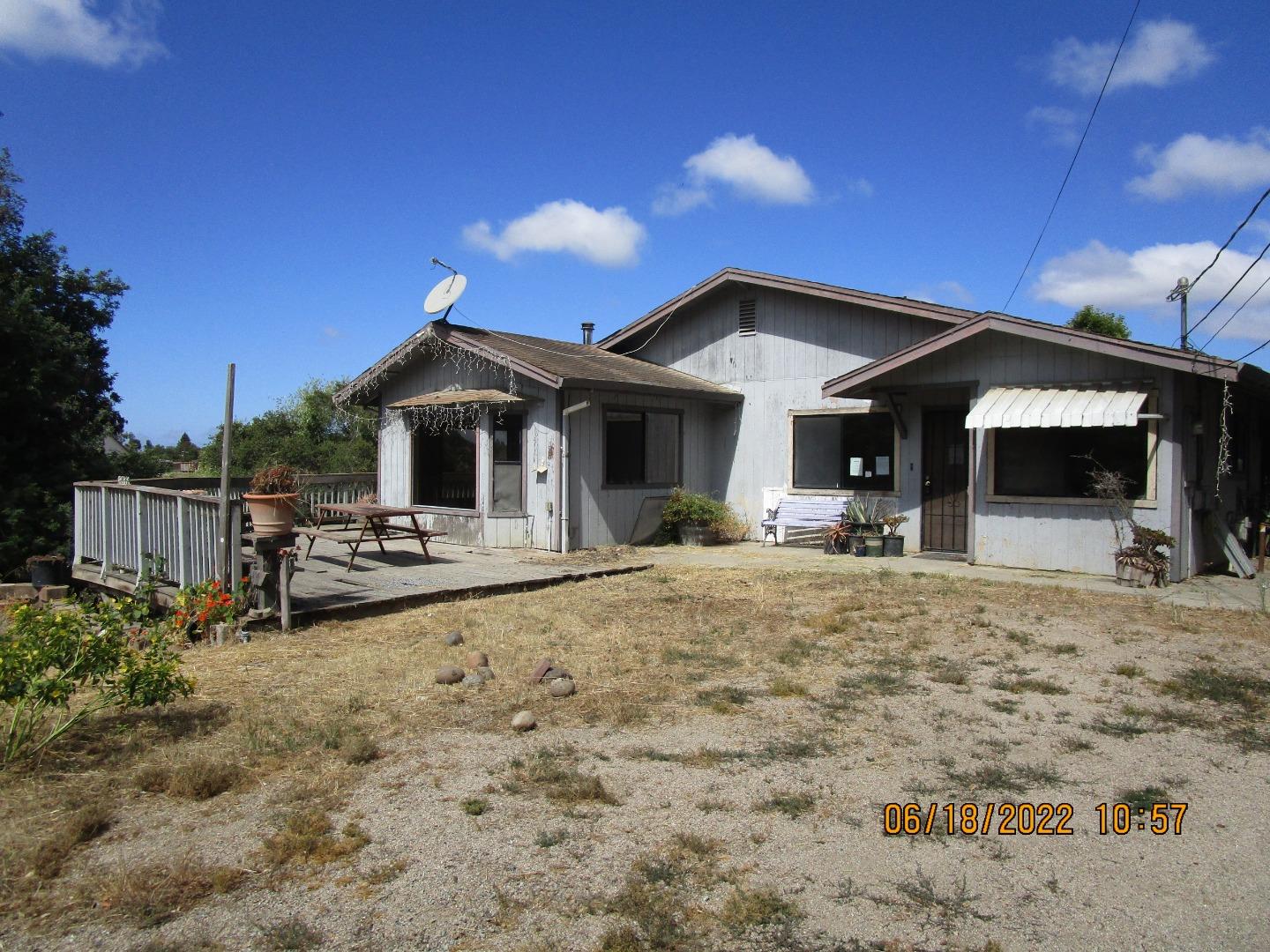 37 Webb Road Watsonville, CA 95076 - Photo 1 of 30 a view of a house with backyard porch and sitting area