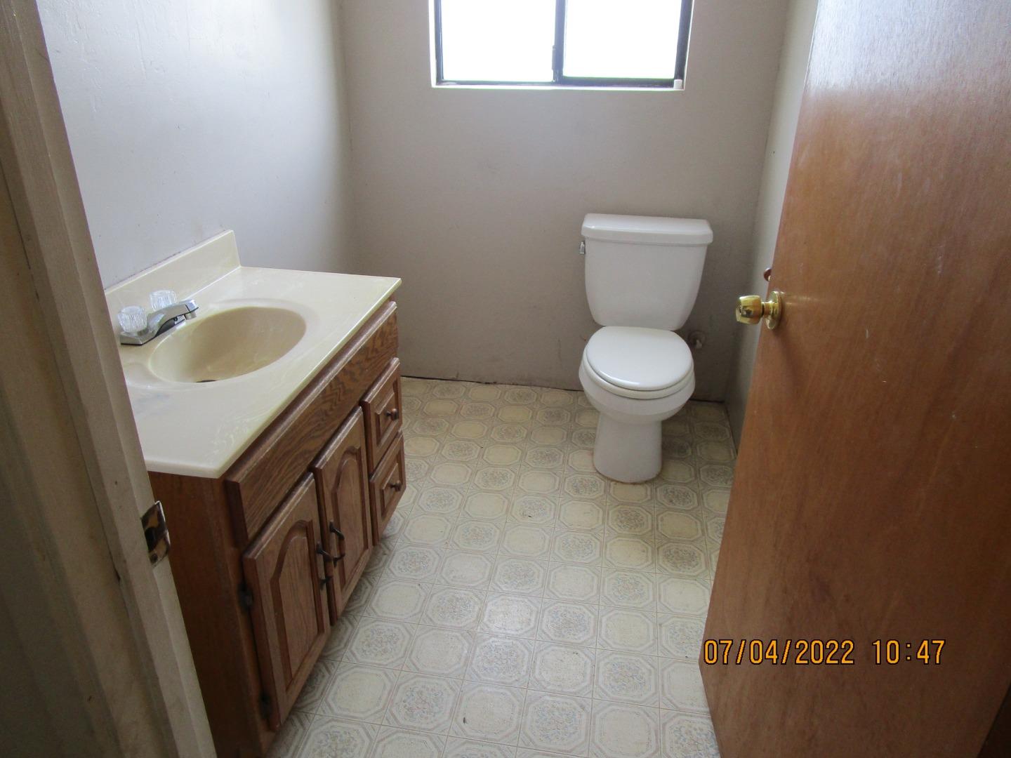 37 Webb Road Watsonville, CA 95076 - Photo 23 of 30 a bathroom with a sink toilet and a mirror