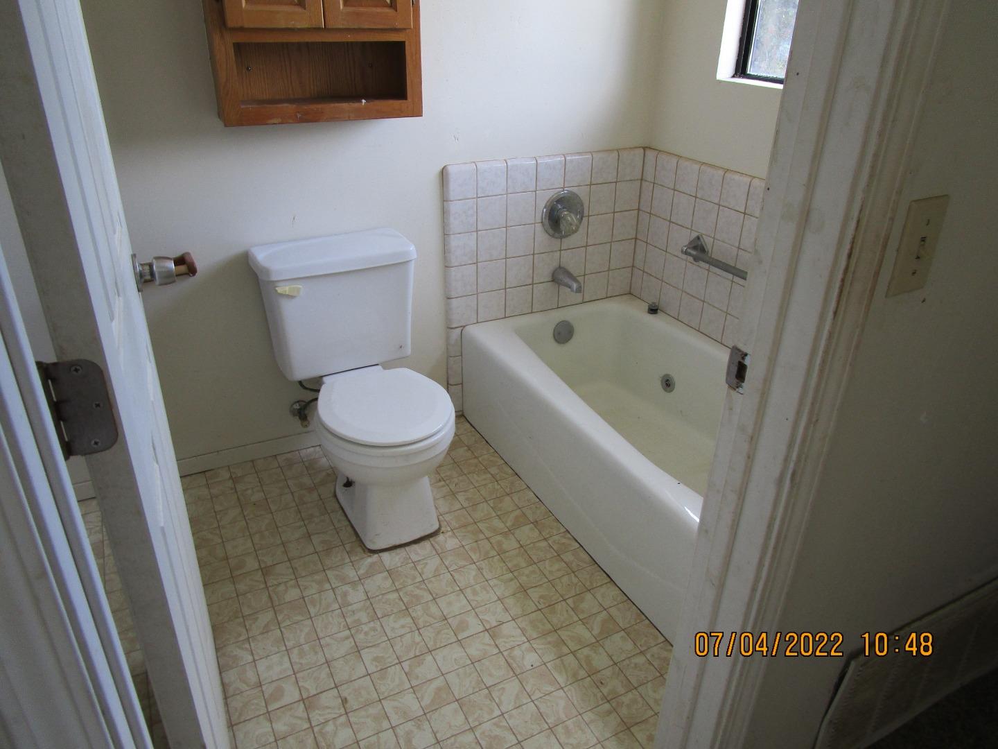 37 Webb Road Watsonville, CA 95076 - Photo 24 of 30 a bathroom with a toilet and a sink