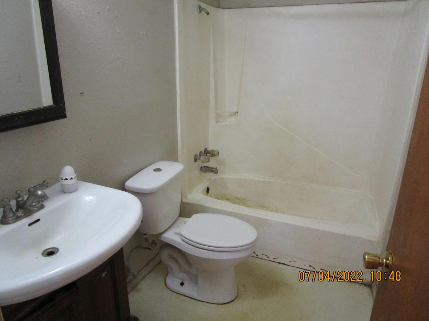 37 Webb Road Watsonville, CA 95076 - Photo 25 of 30 a bathroom with a sink toilet and shower