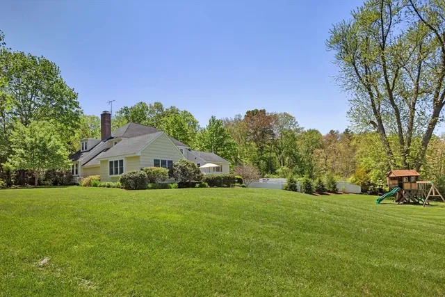 a view of a house with a big yard