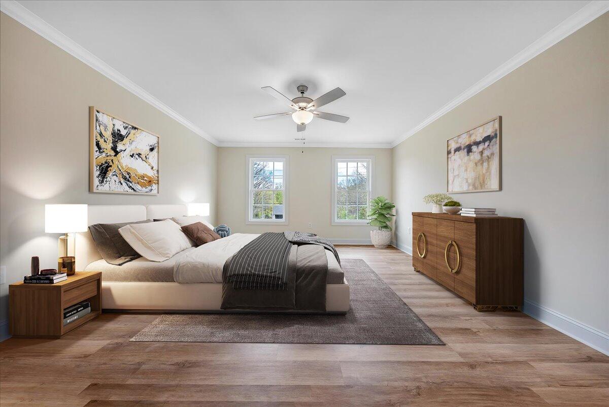 300 Ridgley Lane Fincastle, VA 24090 - Photo 12 of 19 a spacious bedroom with a large bed and a chandelier