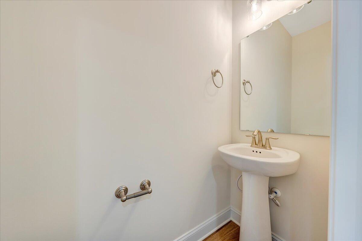300 Ridgley Lane Fincastle, VA 24090 - Photo 17 of 19 a bathroom with a sink a mirror and a toilet