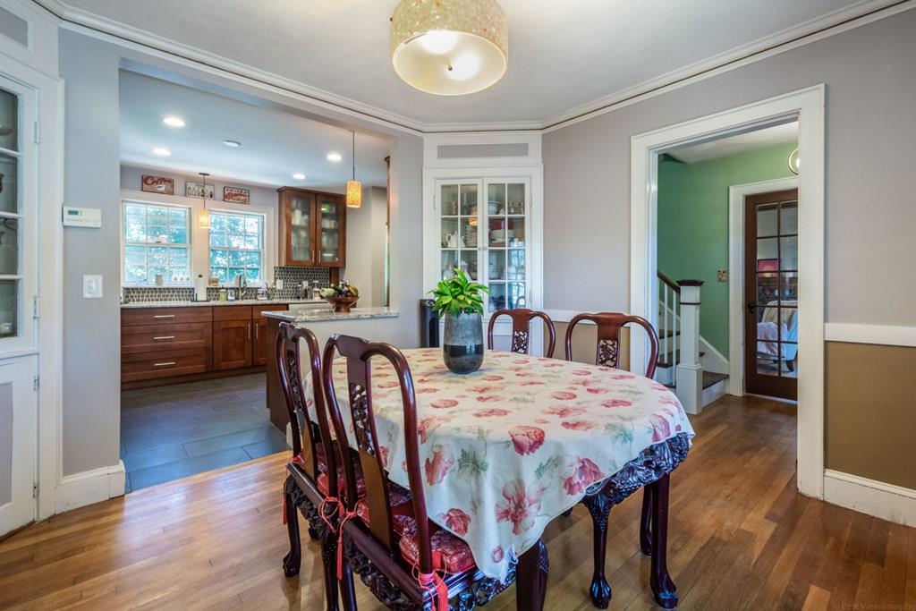 62 Theodore Road Newton, MA 02459 - Photo 11 of 29 a dining room with furniture and wooden floor