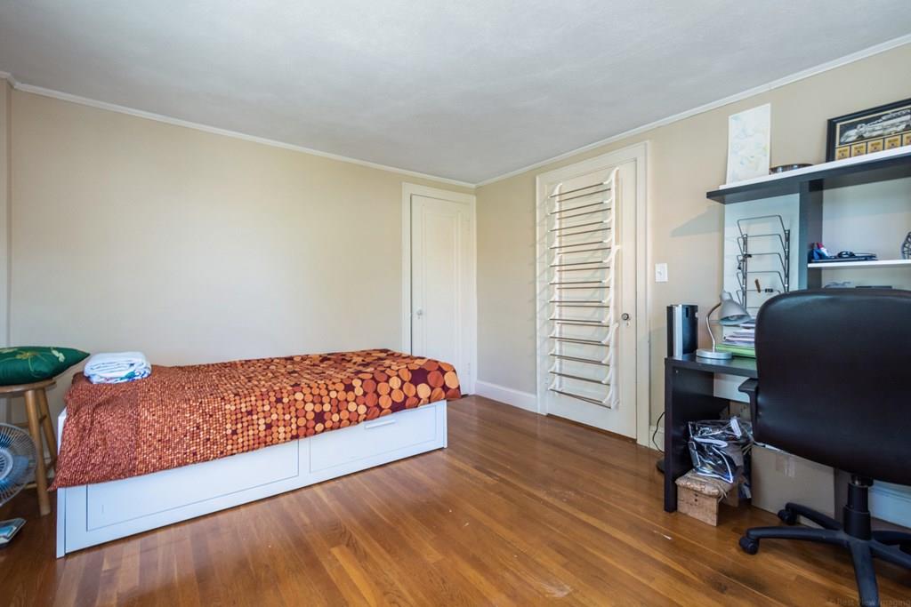 62 Theodore Road Newton, MA 02459 - Photo 18 of 29 a room with a bed and a window
