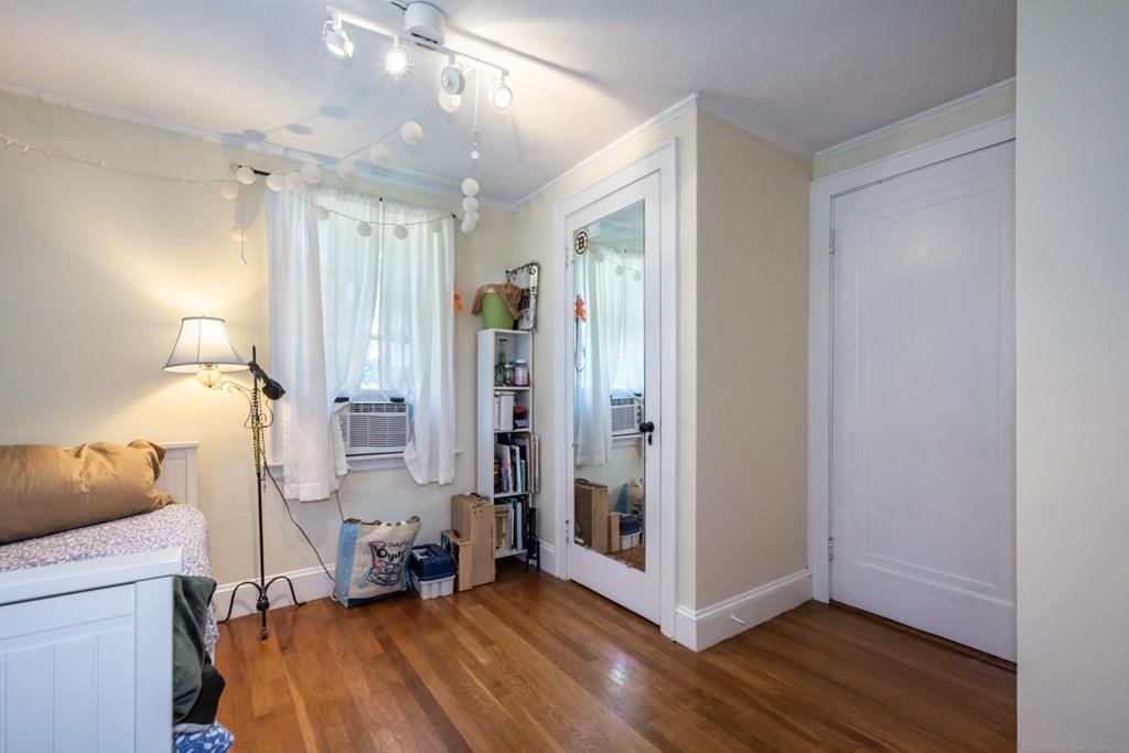62 Theodore Road Newton, MA 02459 - Photo 20 of 29 a view of a room with wooden floor and a bathroom
