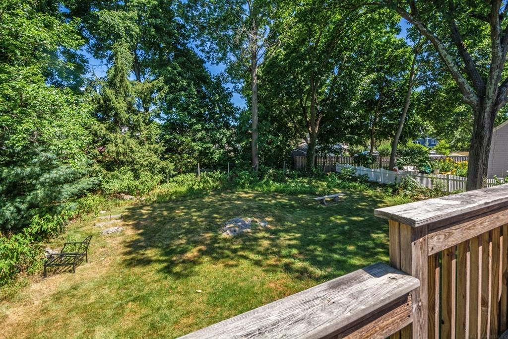 62 Theodore Road Newton, MA 02459 - Photo 24 of 29 a backyard of a house with lots of green space