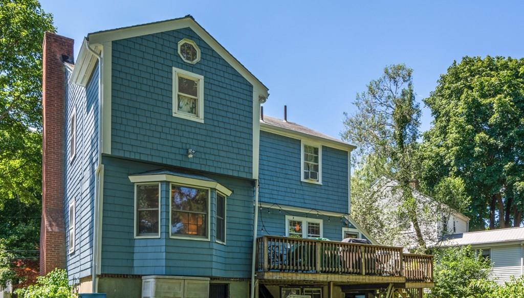 62 Theodore Road Newton, MA 02459 - Photo 26 of 29 a front view of a house with a yard