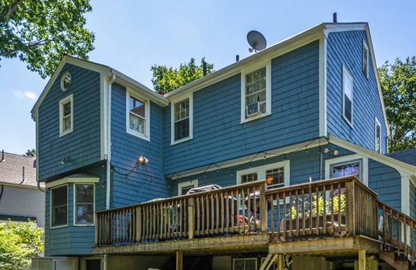 62 Theodore Road Newton, MA 02459 - Photo 27 of 29 a front view of a house with a garden
