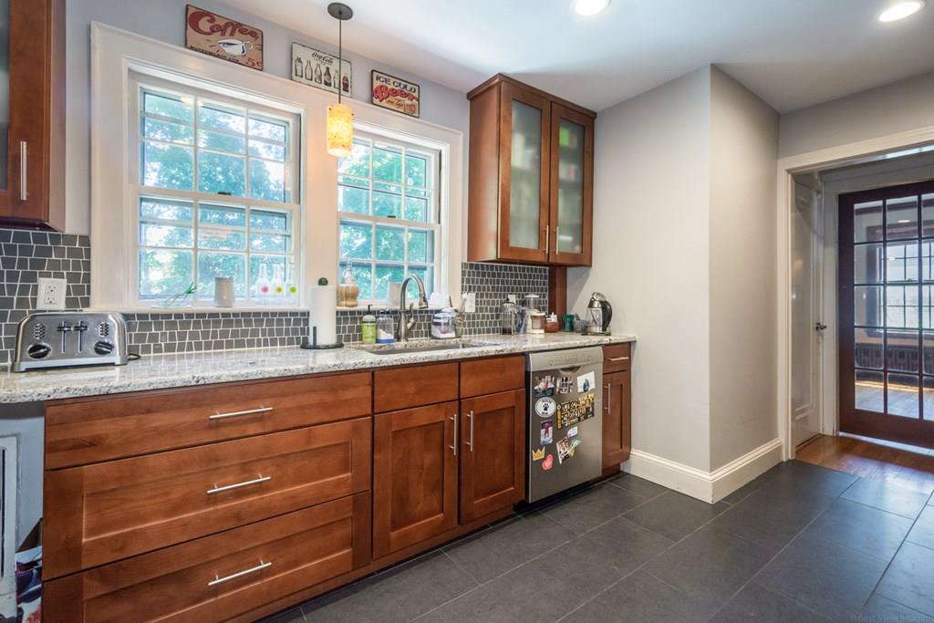 62 Theodore Road Newton, MA 02459 - Photo 8 of 29 a spacious bathroom with double vanity and a large mirror