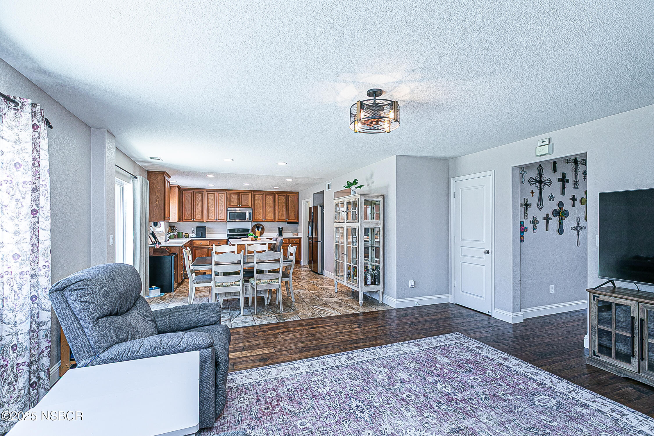 1104 Honda Way Lompoc, CA 93436 - Photo 16 of 36 a living room with furniture and a flat screen tv