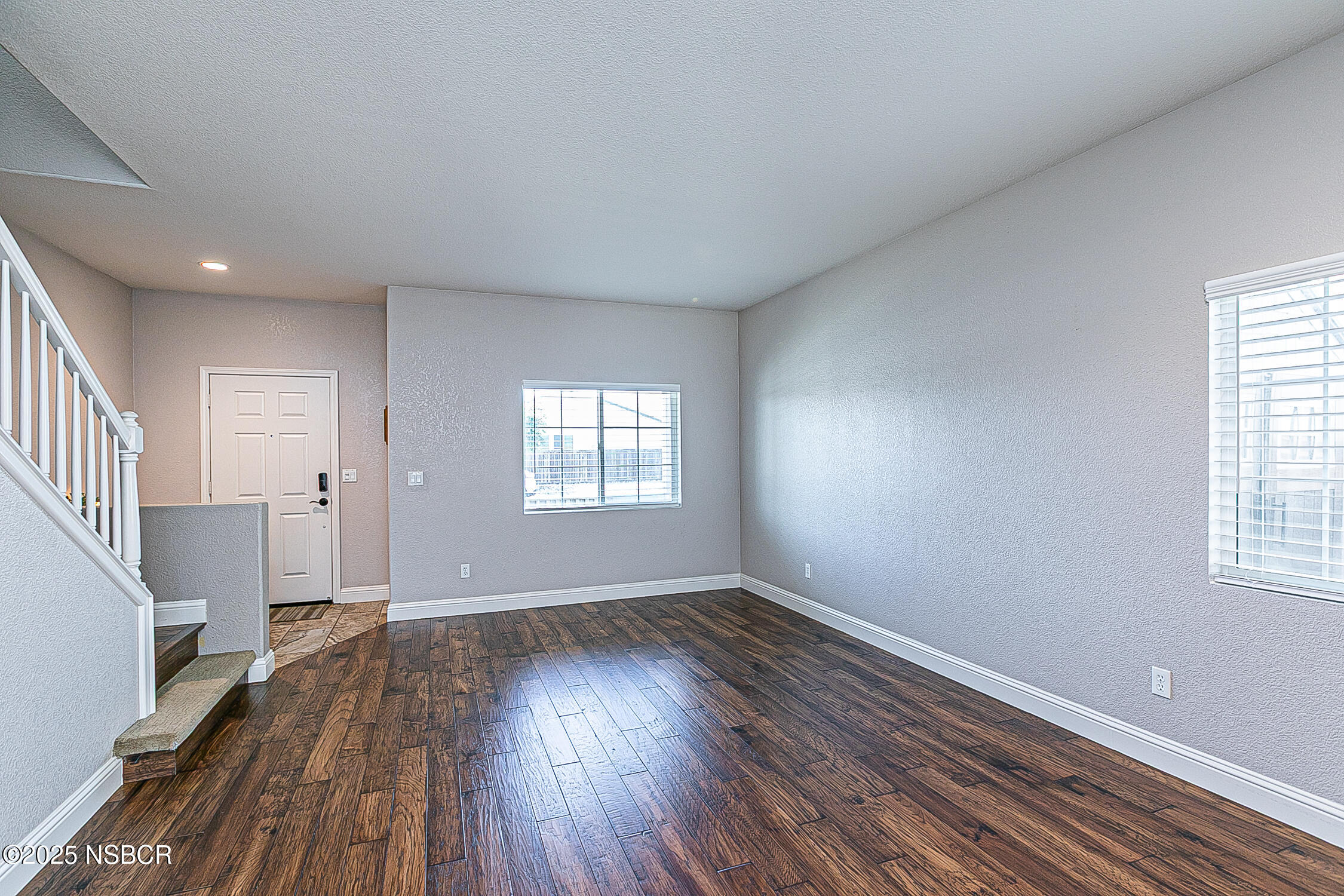 1104 Honda Way Lompoc, CA 93436 - Photo 33 of 36 wooden floor in an empty room with a window