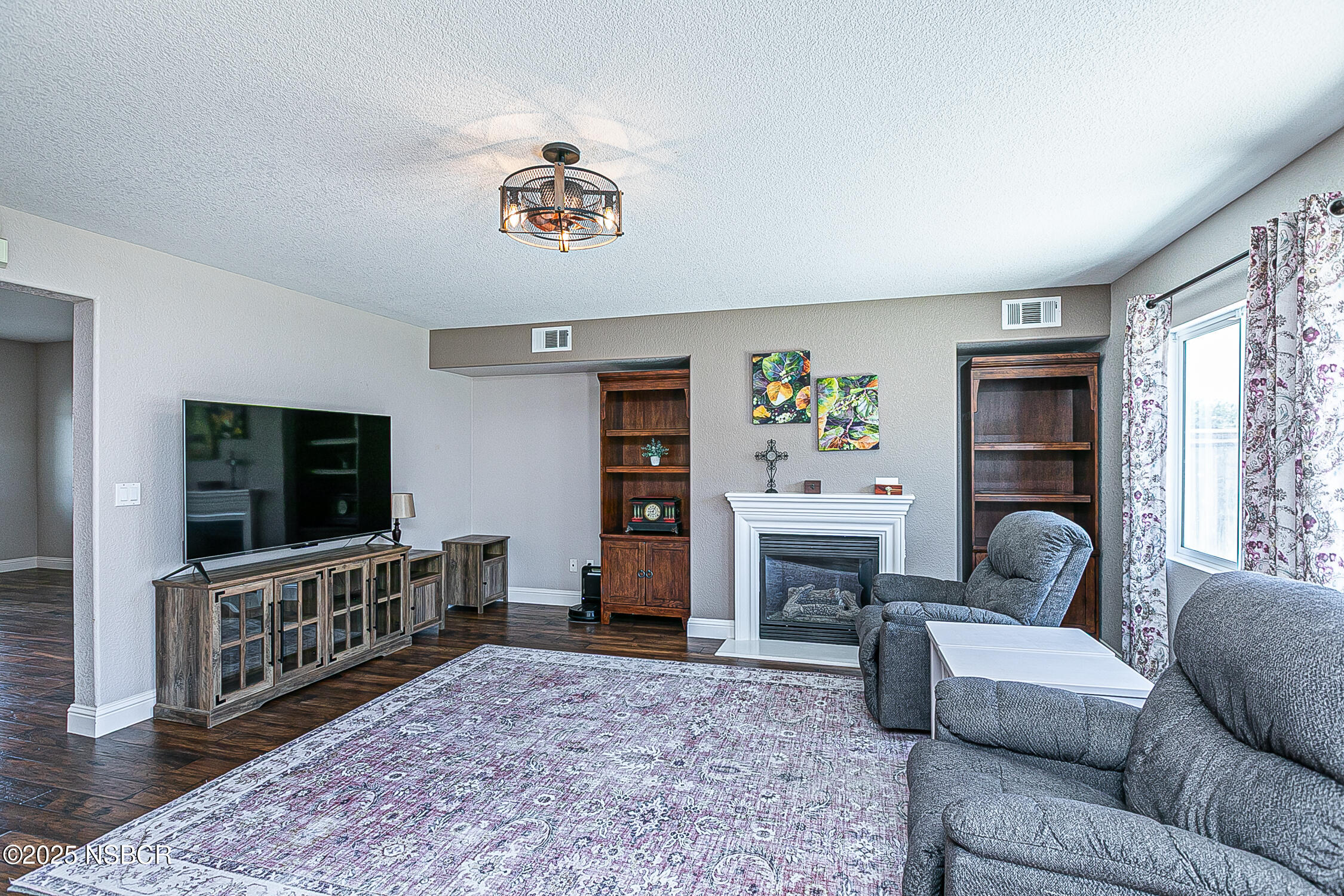 1104 Honda Way Lompoc, CA 93436 - Photo 4 of 36 a living room with furniture and a flat screen tv