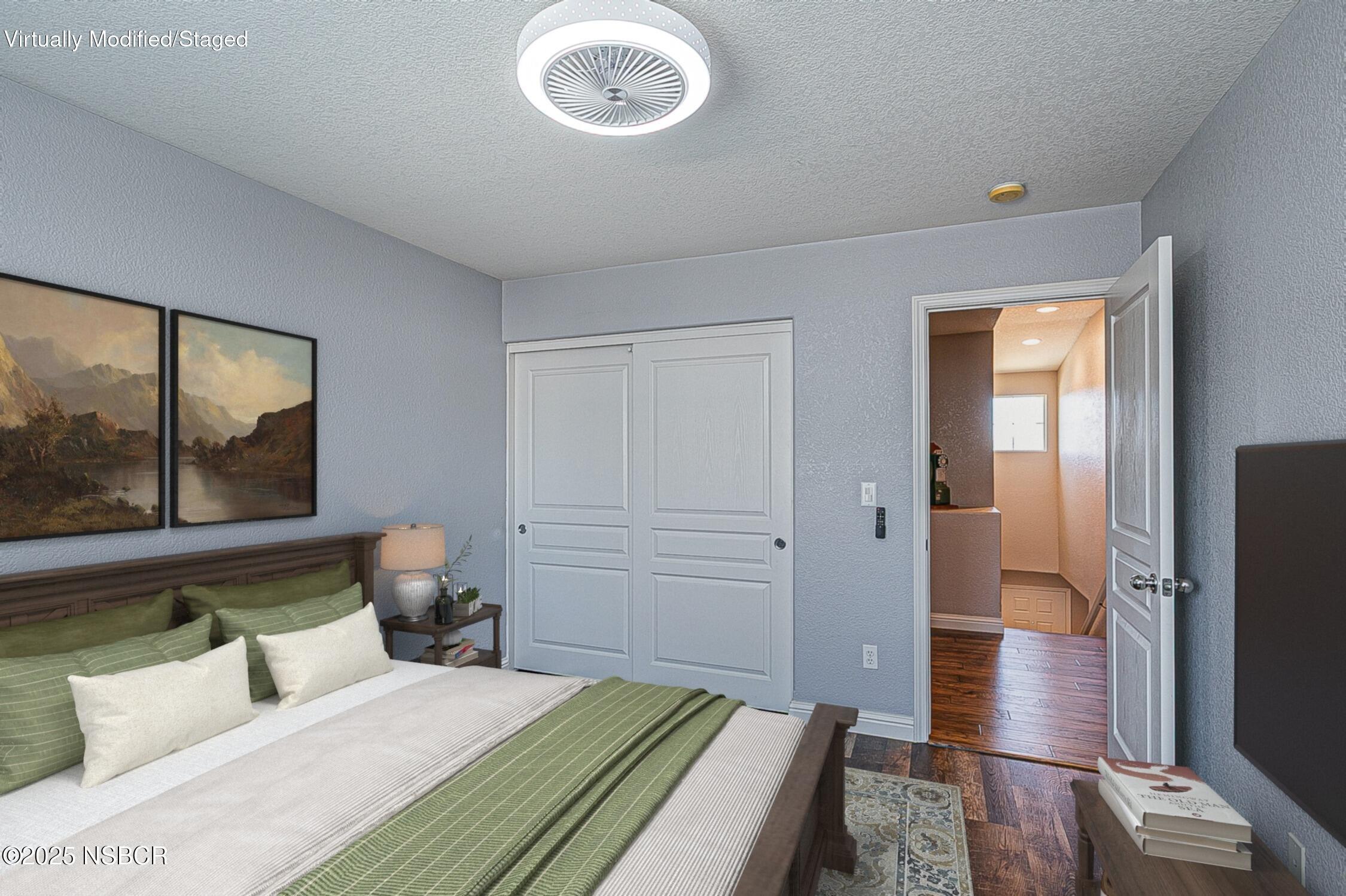 1104 Honda Way Lompoc, CA 93436 - Photo 7 of 36 a bedroom with a bed and a large window