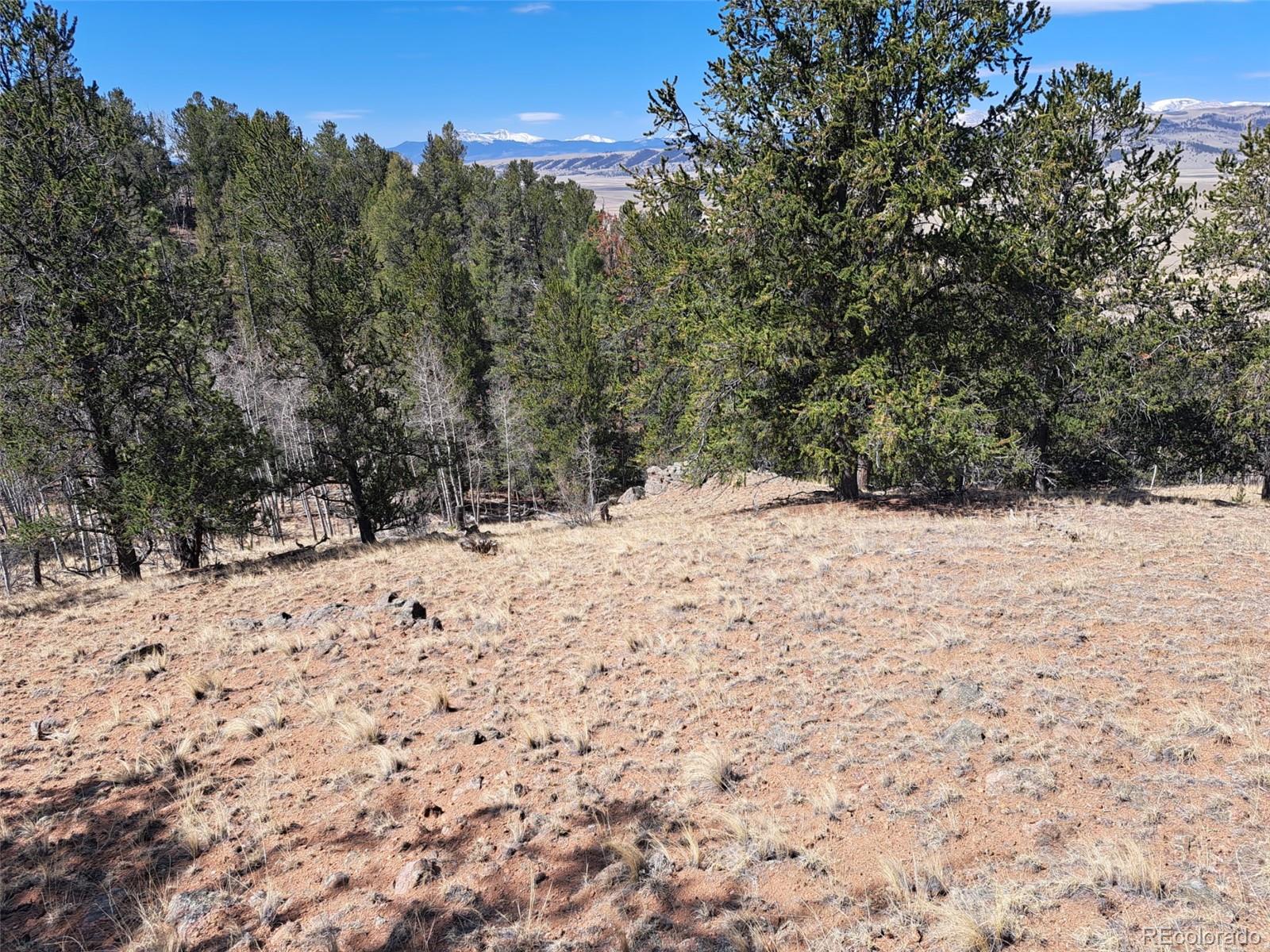 182 Starling Way Como, CO 80432 - Photo 22 of 37 a view of a covered with snow in the background