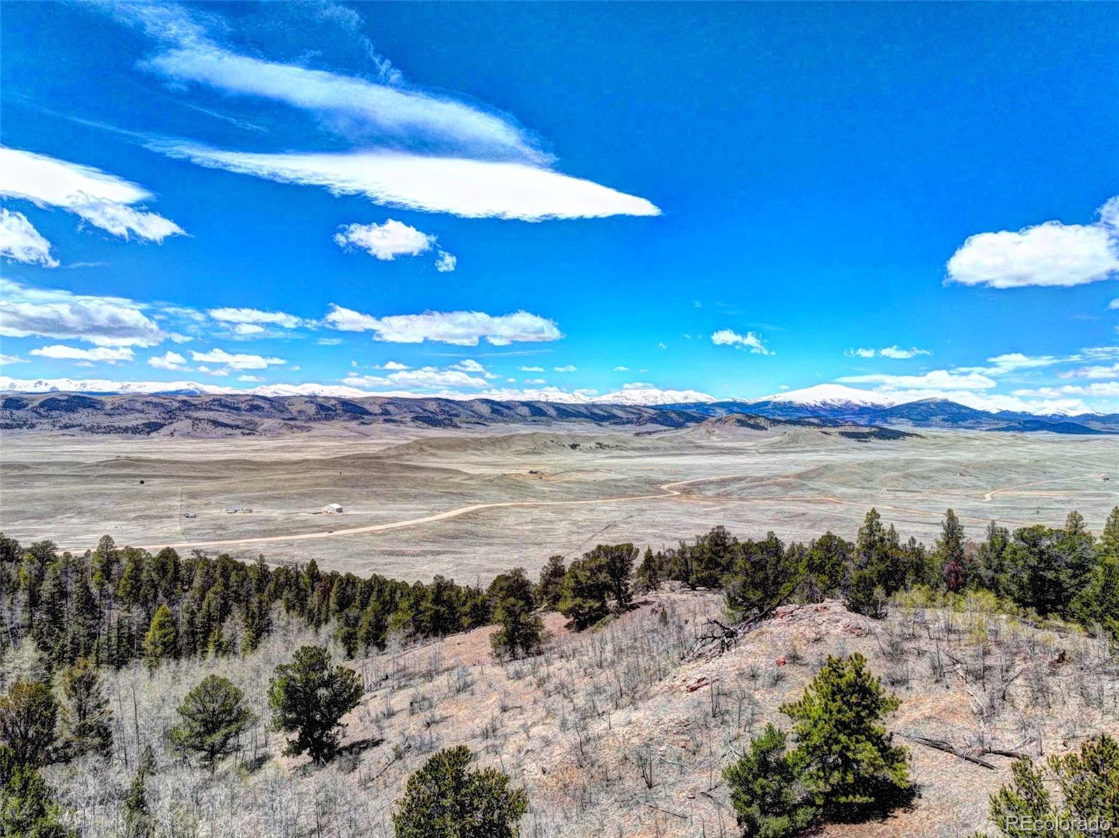182 Starling Way Como, CO 80432 - Photo 5 of 37 a view of a lake with a beach