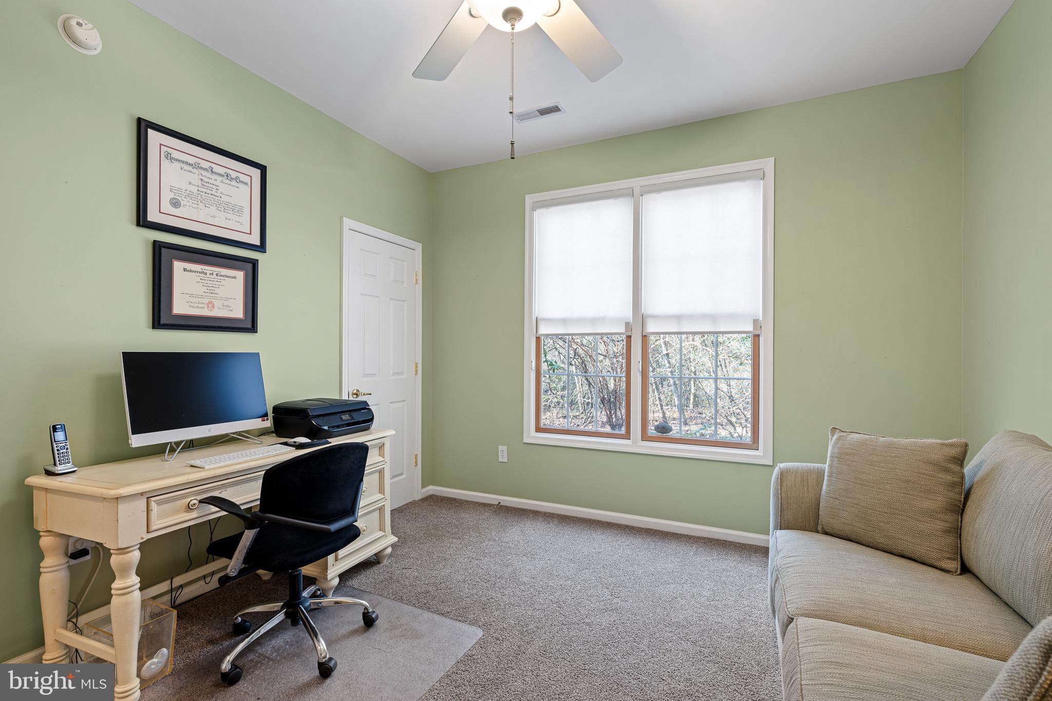 38744 Skipjack Village Road, Unit 14 Bethany Beach, DE 19930 - Photo 16 of 70 a view of a livingroom with workspace and a window