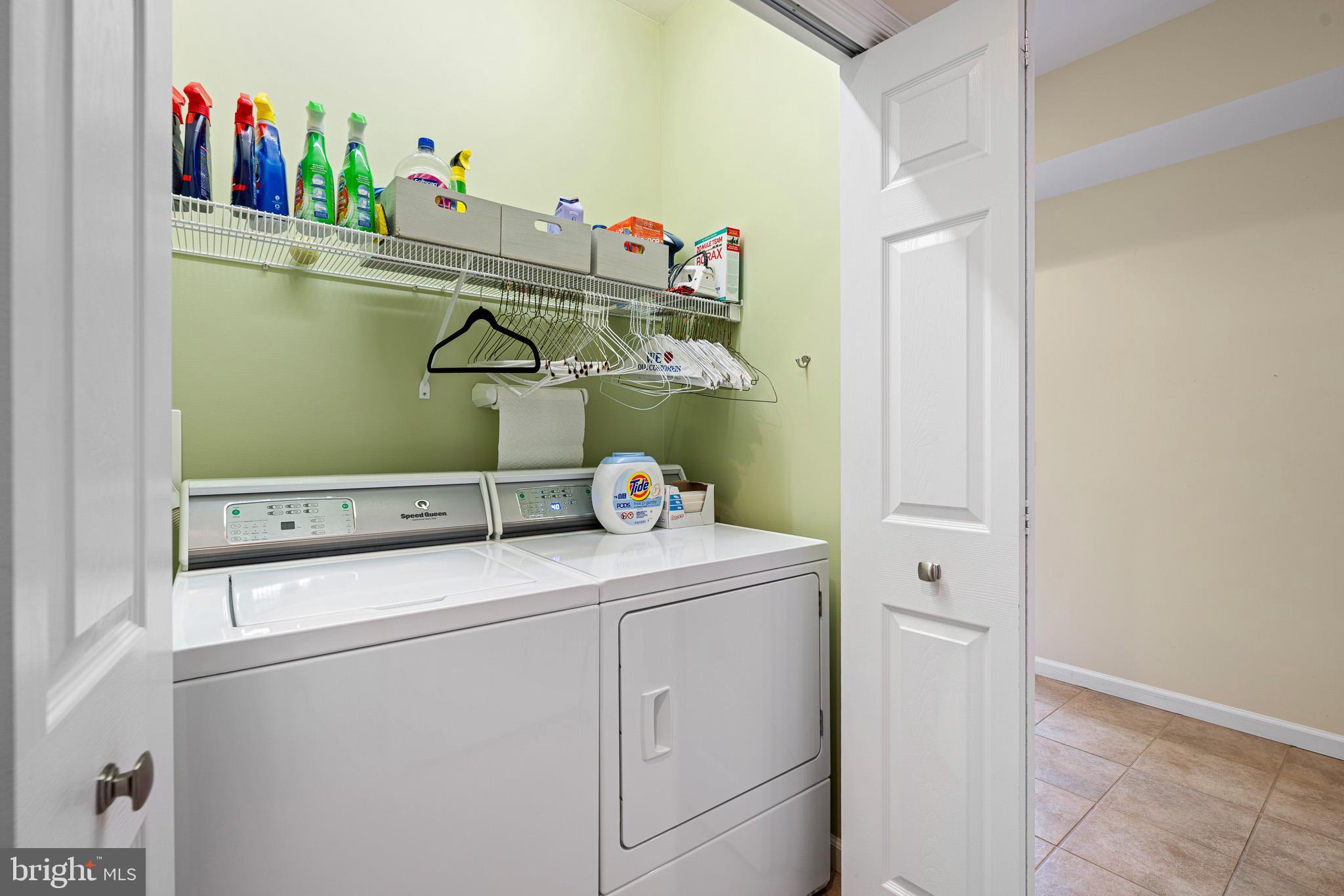 38744 Skipjack Village Road, Unit 14 Bethany Beach, DE 19930 - Photo 38 of 70 a utility room with dryer and washer