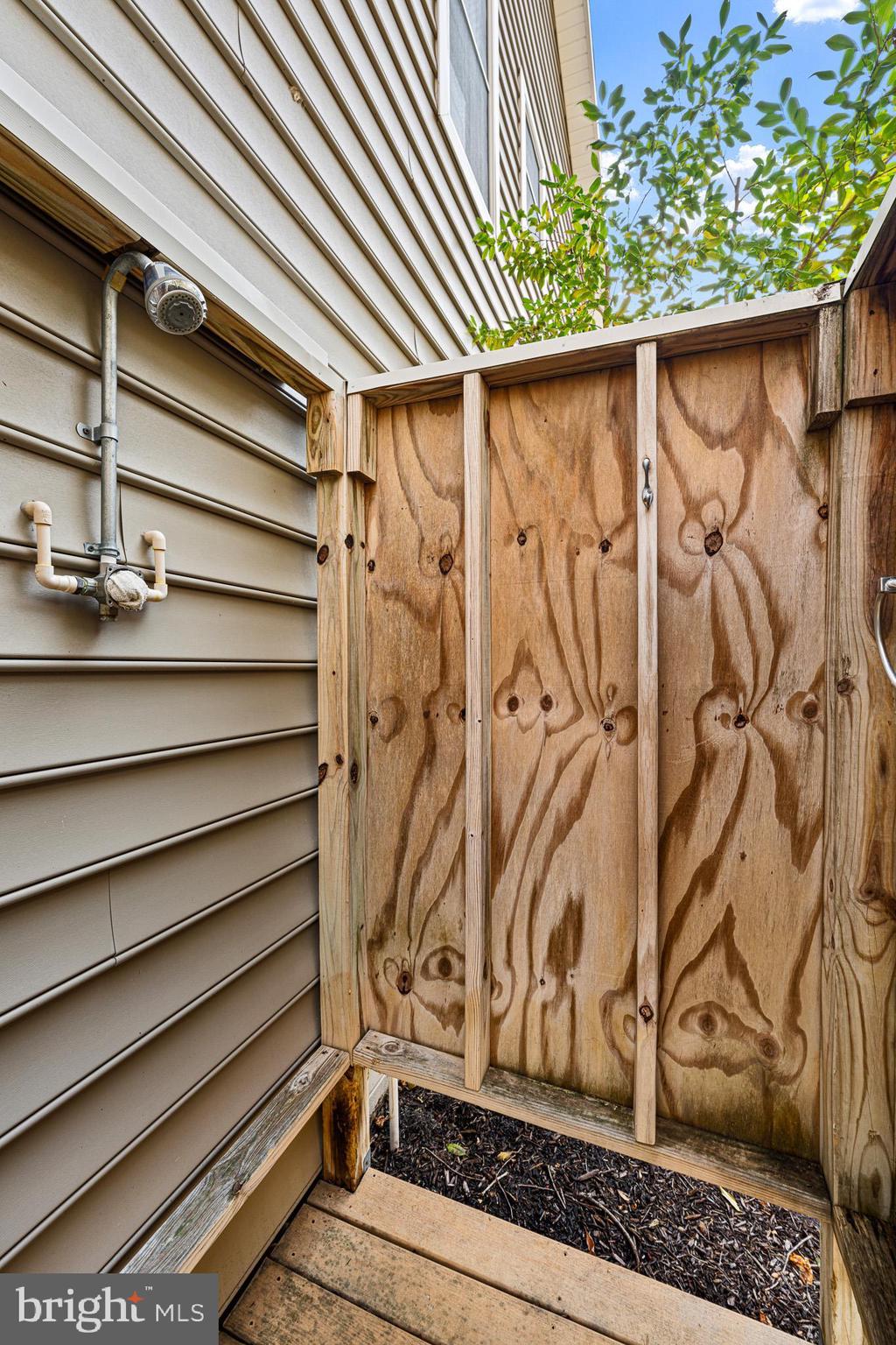 38744 Skipjack Village Road, Unit 14 Bethany Beach, DE 19930 - Photo 41 of 70 a side view of a house with a window